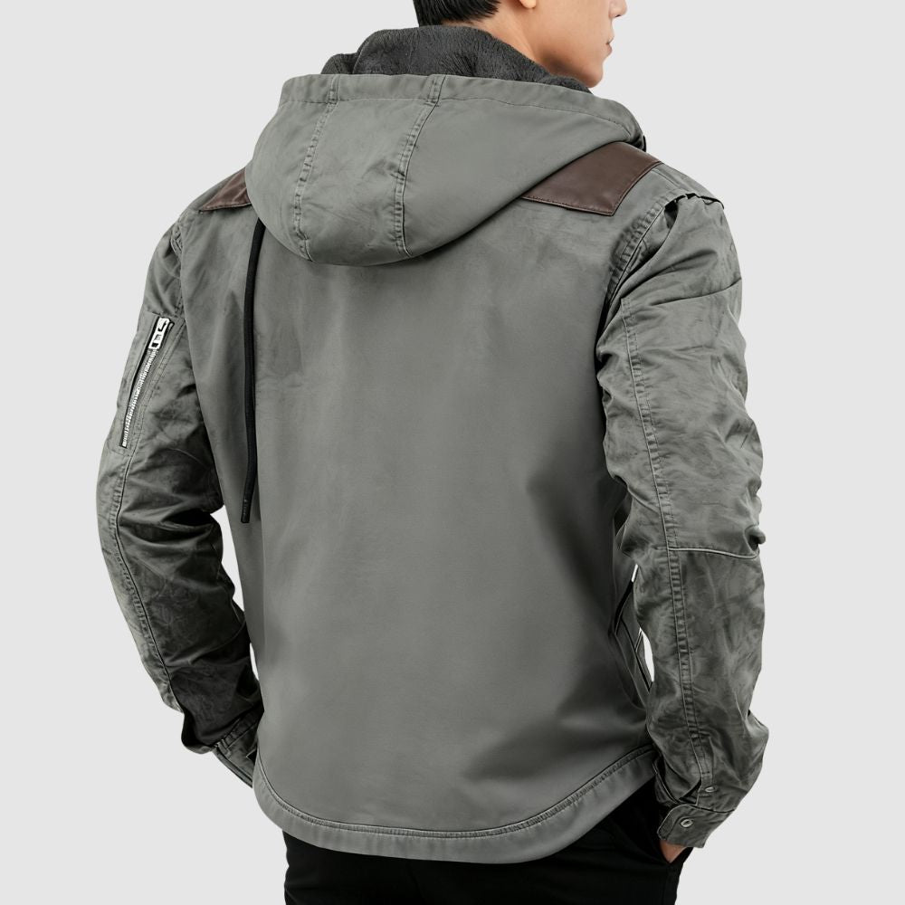 Front view of the Men's Kouvr Tyrian sherpa lined hooded work jacket in Coyote Brown.
