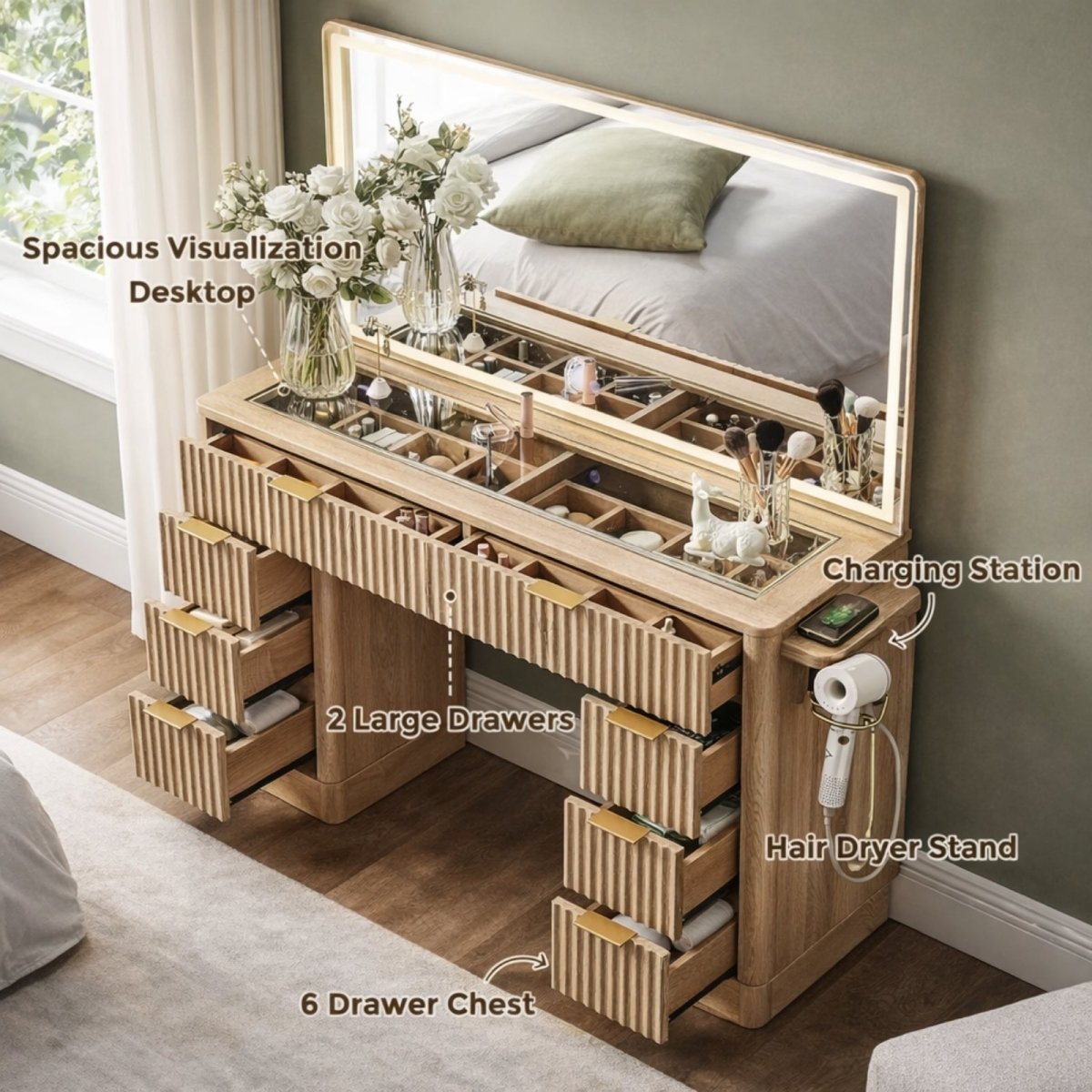 Close-up overhead view of the Kouvr vanity's tempered glass top, showing organized cosmetics like lipstick and perfume inside the top drawers.