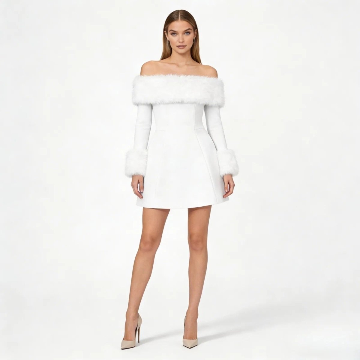 Model wearing the Kouvr white off-the-shoulder mini dress with faux fur trim on the neckline and long sleeve cuffs, shown from the front.