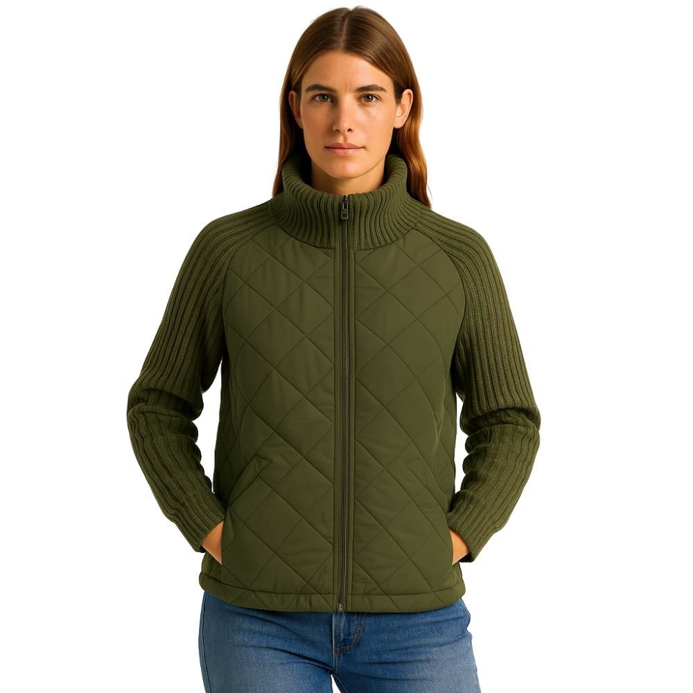 Model wearing the Kouvr Arlington Quilted Hybrid Jacket with blue jeans