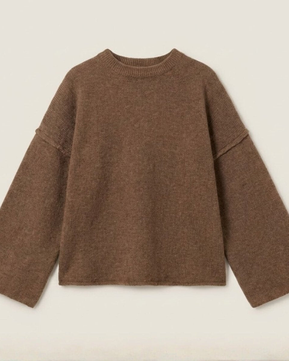 Flatlay product shot of the Krystal bell sleeve sweater in brown, displaying the texture of the alpaca wool blend knit.