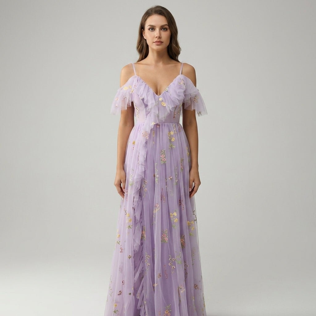Angled view highlighting the delicate gold and pink floral embroidery on the romantic purple tulle formal dress by Kouvr.