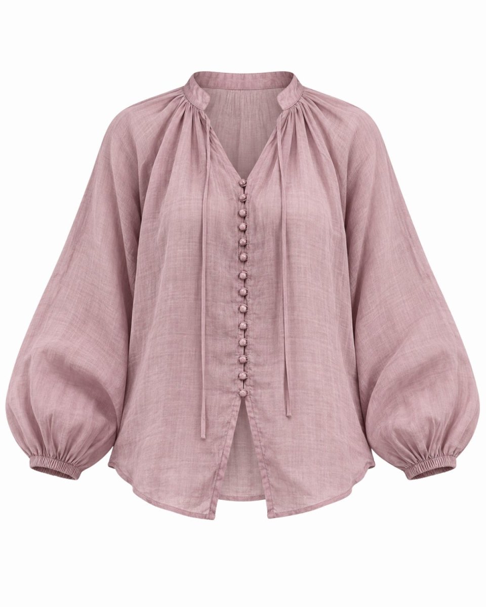 A lavender linen blouse with a gathered high neck, front button closure, and voluminous balloon sleeves, shown against a plain white background.