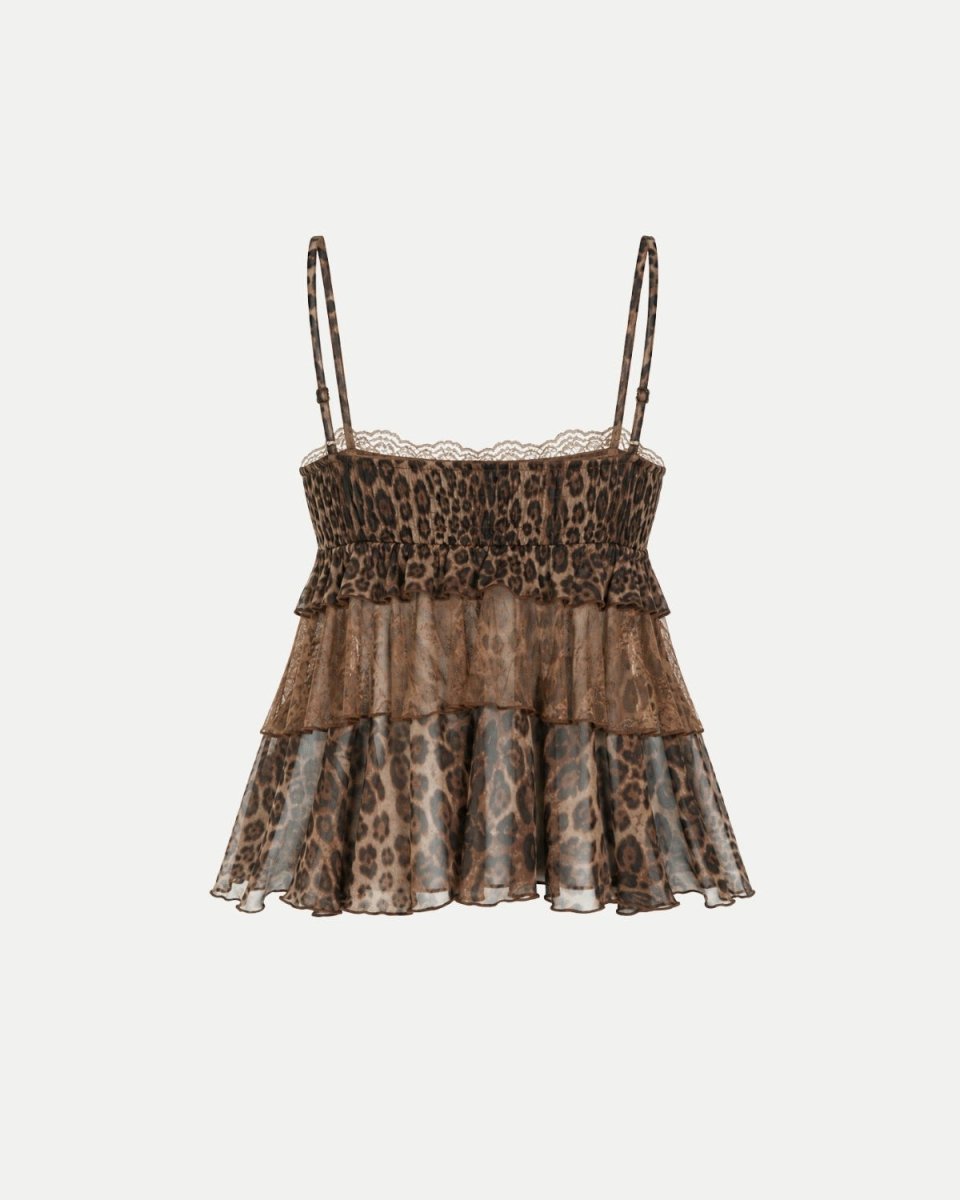 A leopard print camisole top with thin straps, a lace-trimmed sweetheart neckline, a smocked waist, and a tiered ruffled skirt, shown against a plain light gray background.