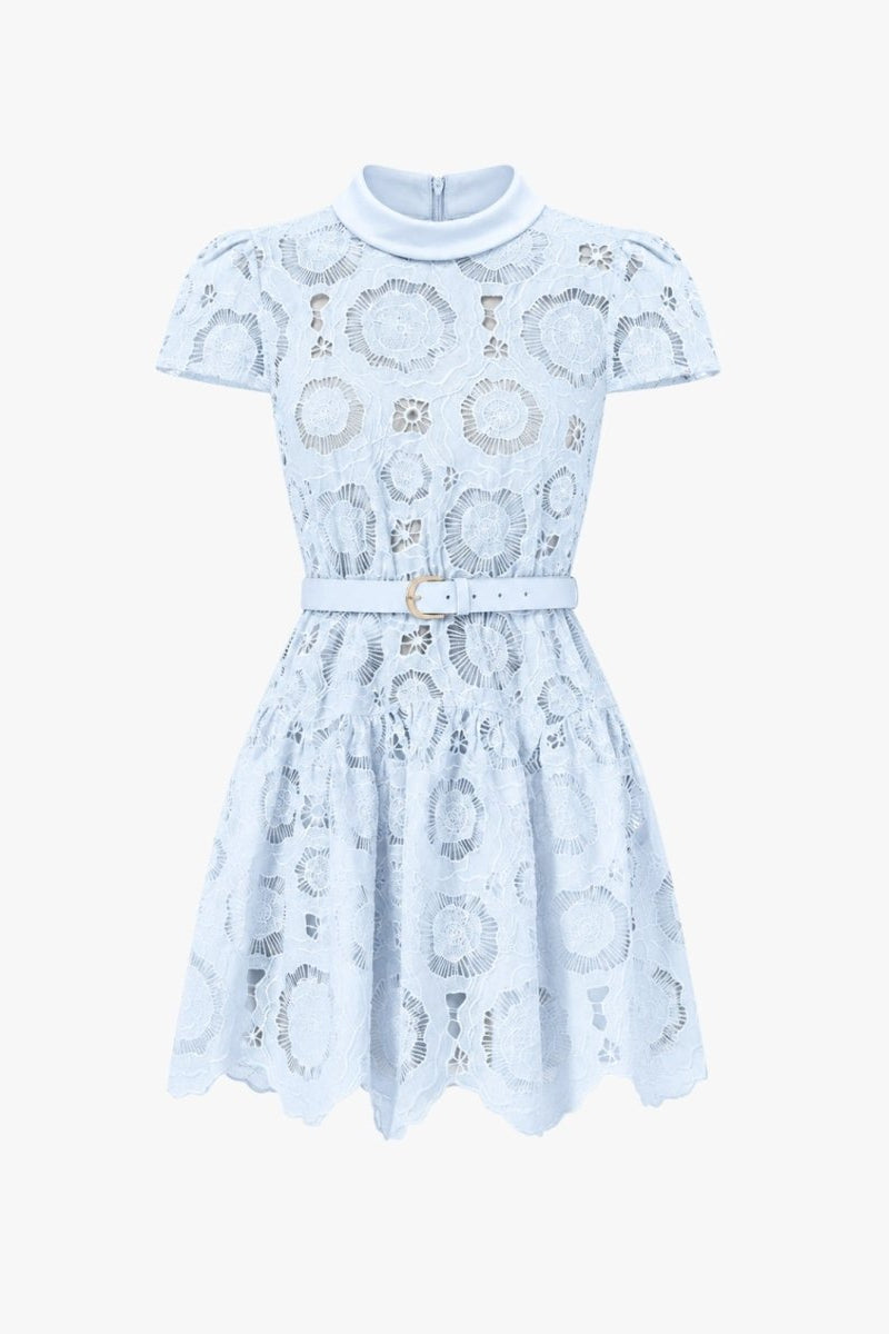 Studio shot of Fenlo Form light blue lace skater dress highlighting intricate floral guipure fabric construction.