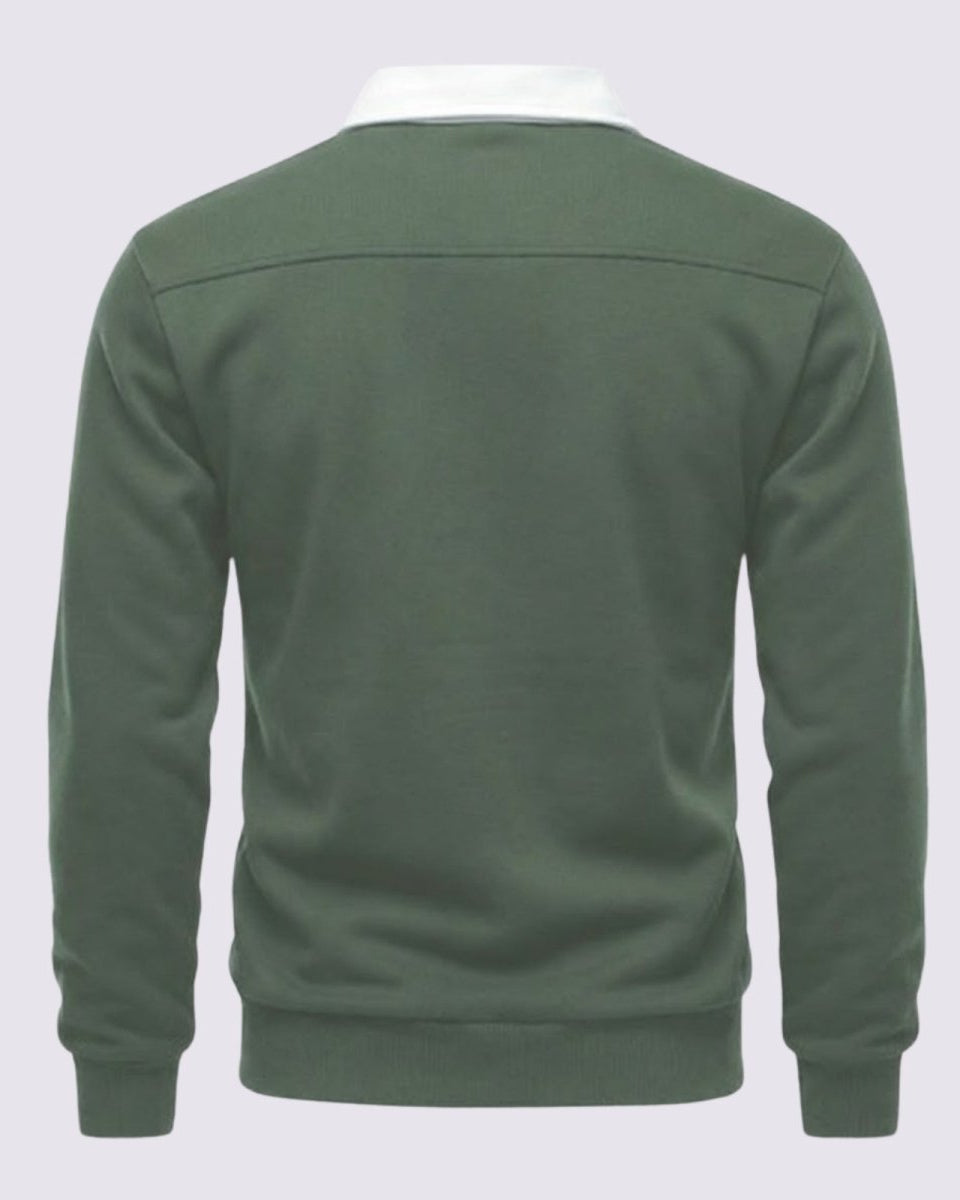 Back product shot of the long-sleeve polo in green, showing the back yoke detailing.