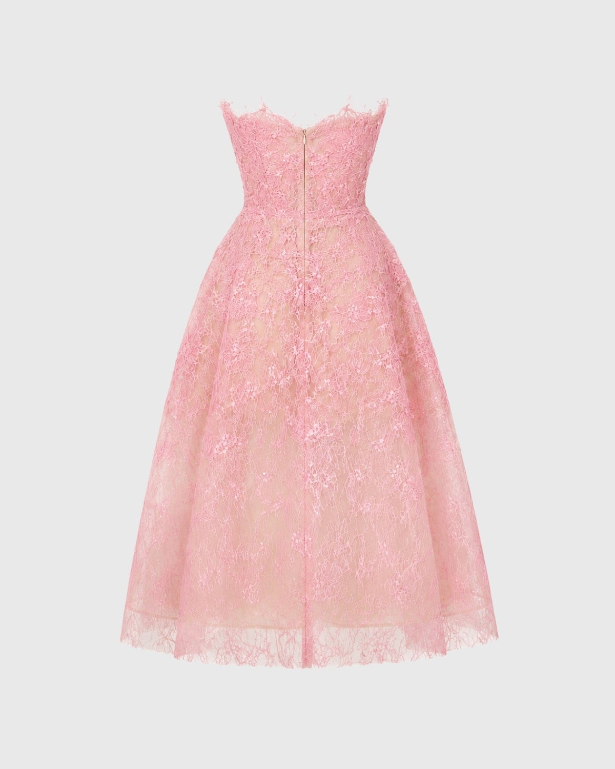 A light pink strapless lace dress with a fitted corset-style bodice and a full flared skirt, shown against a plain light gray background.