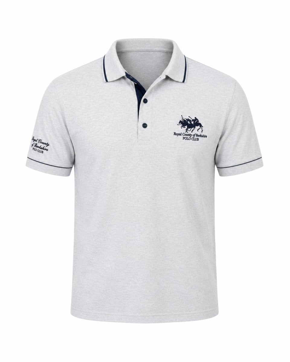 A light gray heathered short-sleeve polo shirt with navy blue trim on the collar and sleeve cuffs, featuring a navy blue embroidered logo of a horse rider on the left chest and text on the right sleeve.