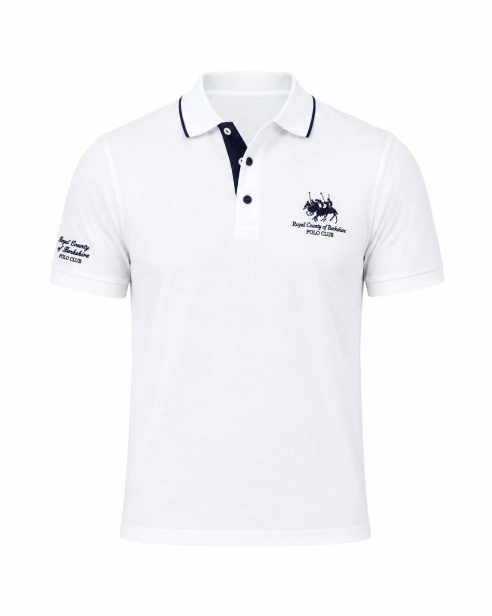 A white short-sleeve polo shirt with a navy blue collar and button placket, featuring a navy blue embroidered polo player logo and text on the left chest, and matching embroidery on the right sleeve, shown against a plain white background.