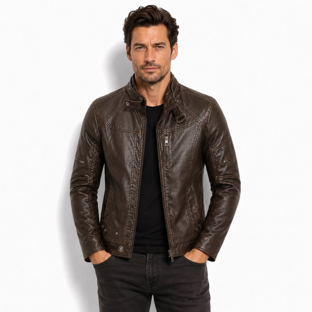 Front view of male model wearing Kouvr mens dark brown premium distressed leather moto jacket with slim fit and stand collar.
