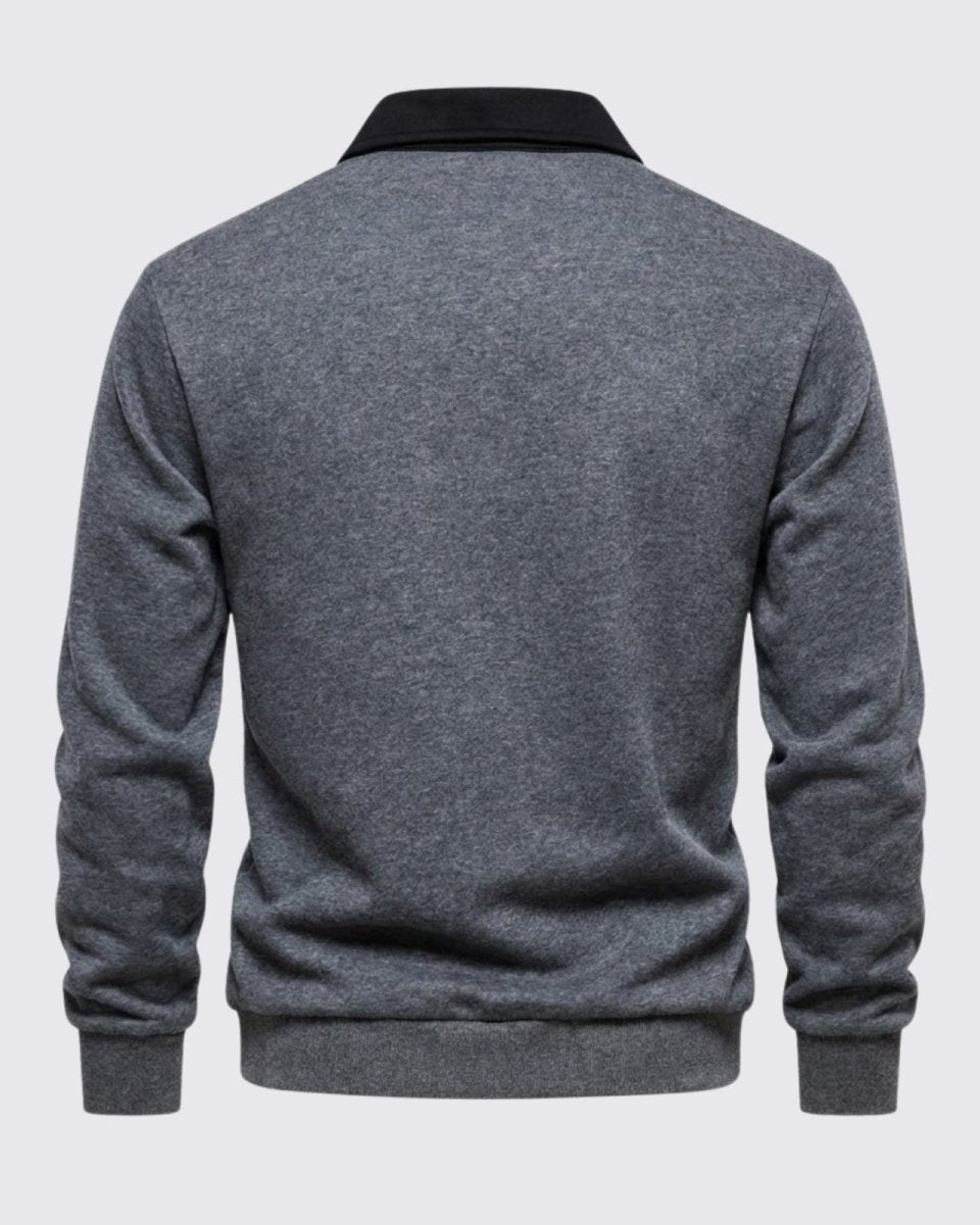 Back view of the men's heather dark grey merino wool polo sweater demonstrating the clean drape and fit.
