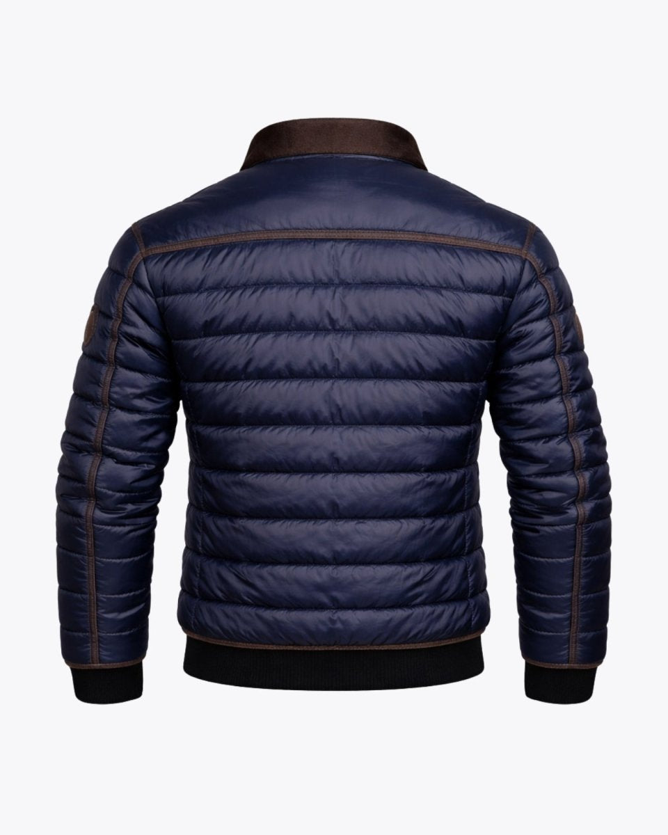 Flat lay back view of the Fenlo Form men's navy blue quilted outerwear showing horizontal stitching and brown shoulder piping.