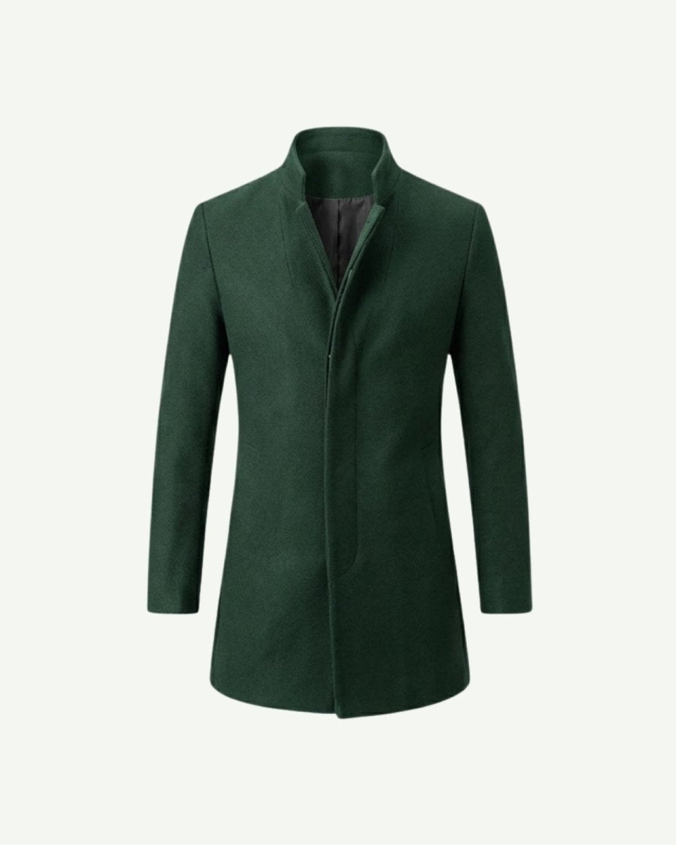 Product shot of a men's dark green funnel neck overcoat on a white background, showing the button front and minimalist design.
