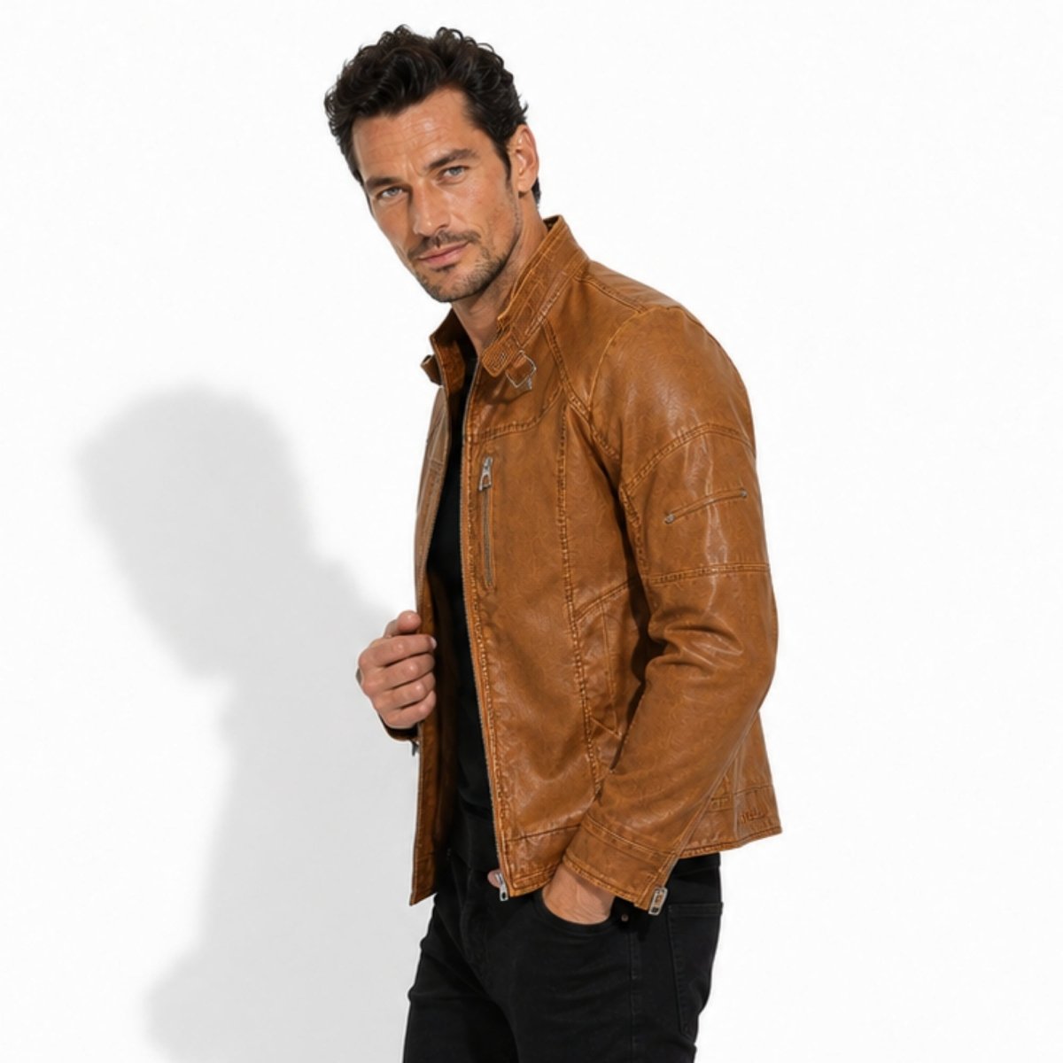 Side profile of Kouvr mens tan brown distressed leather cafe racer showing sleeve fit.