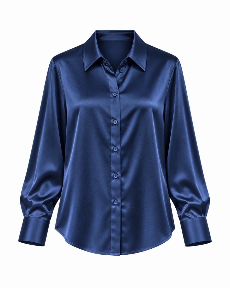 A long-sleeve silk button-up blouse in a rich navy blue color, displayed on a clean white background.