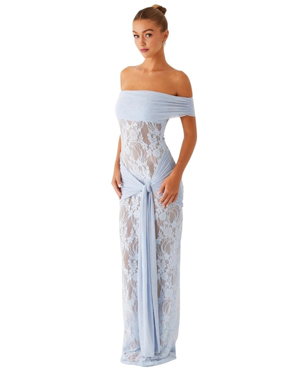 Woman wearing a light blue Fenlo off-shoulder lace gown on a white background