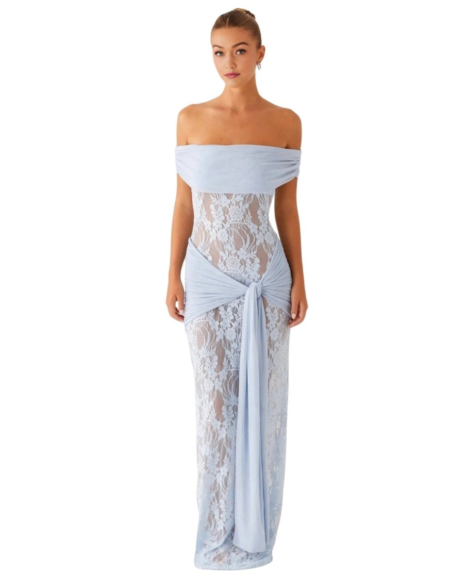 Woman wearing a light blue Fenlo off-shoulder lace gown on a white background