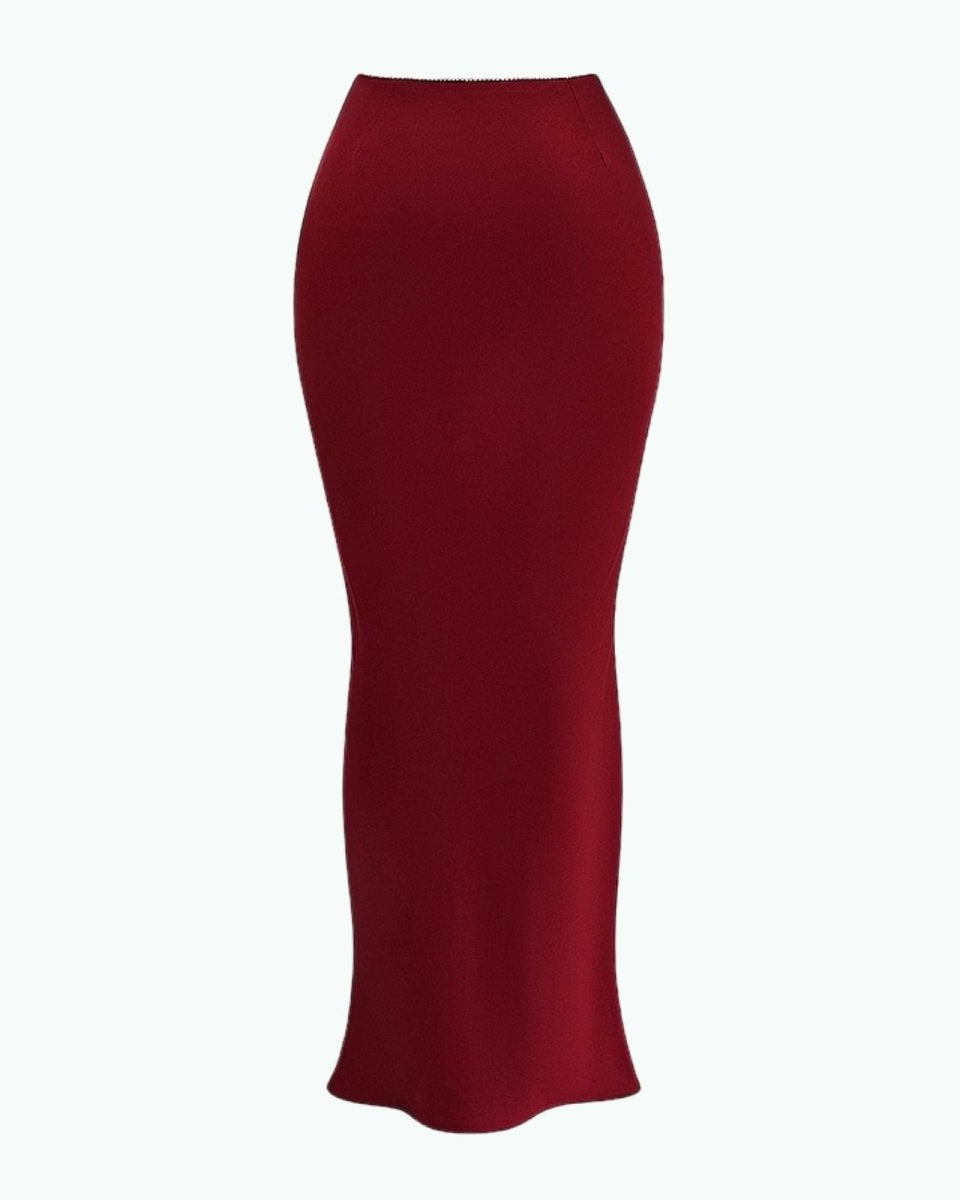 Product-only studio image of the back of the Ourania bias cut satin maxi skirt in red.