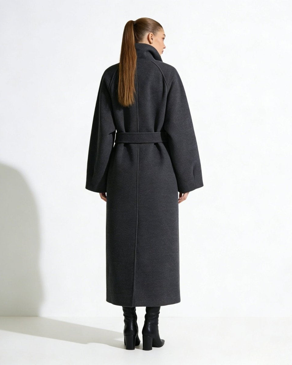 Back view of the Patrice long belted wool coat in gray, showing the clean lines and oversized fit on a model.