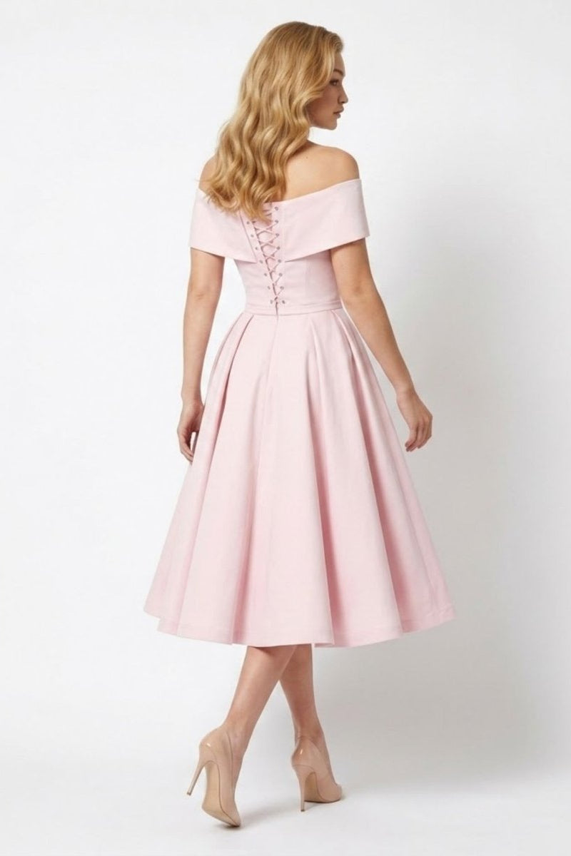 Back view of pink midi dress featuring adjustable lace-up corset detail