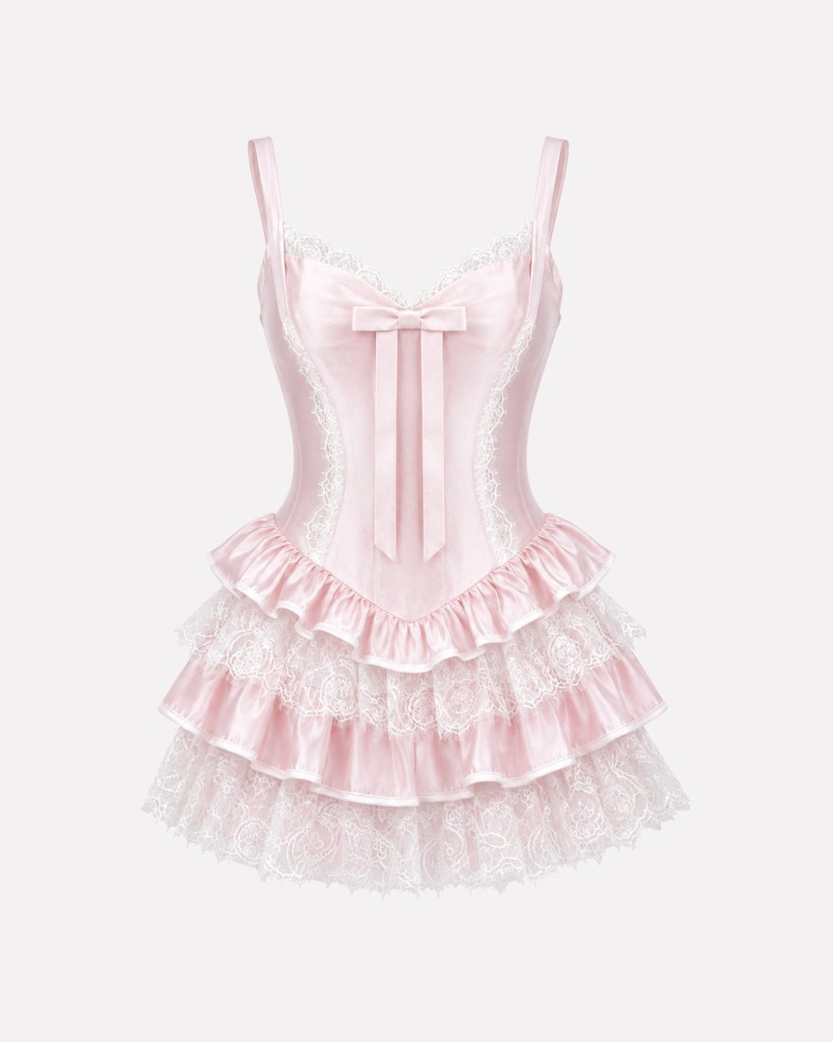 Product shot of a baby pink satin and lace tiered babydoll dress with a structured sweetheart neckline.