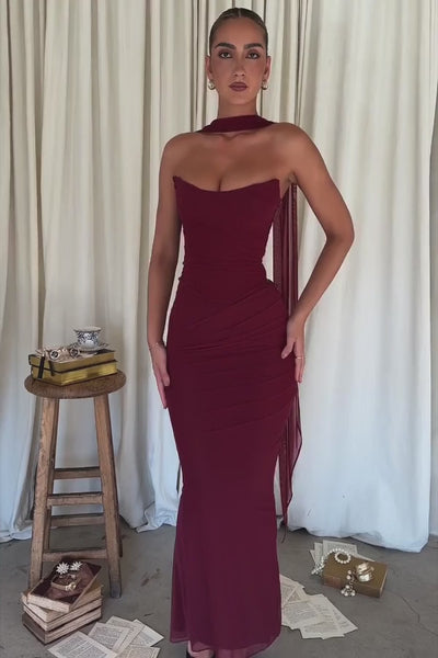 Close-up detail of the Hailey dress in burgundy, showing the corset bodice boning and ruched mesh fabric.
