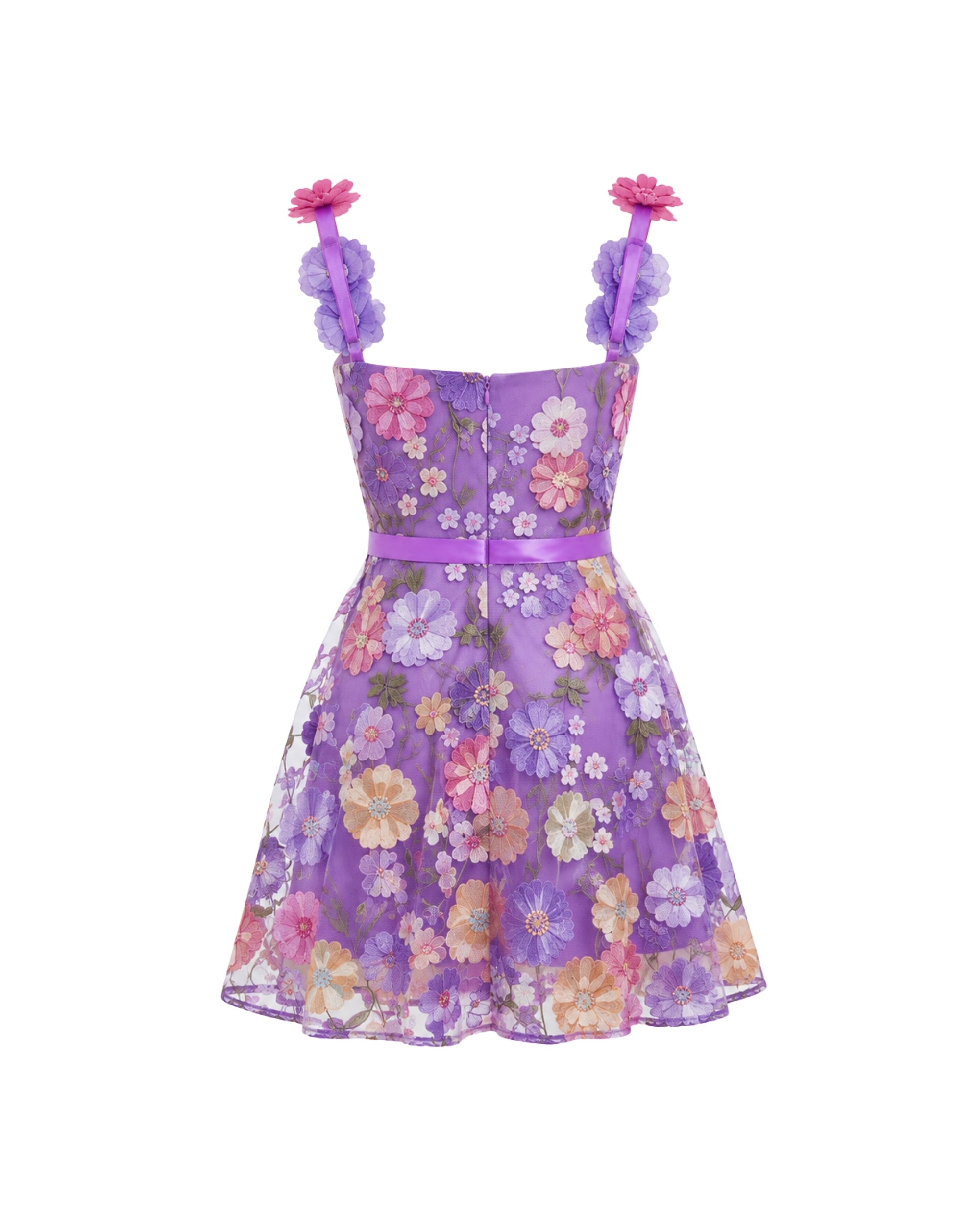 A purple sleeveless dress with a floral print, featuring ruffled shoulder straps adorned with pink flower details and a matching purple waistband.