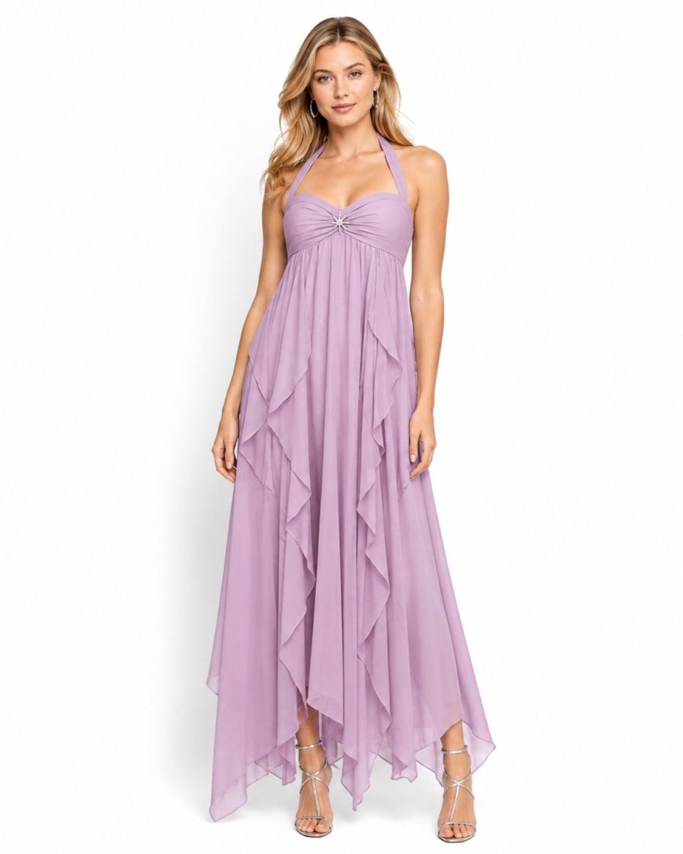 A woman modeling a lavender halter-neck maxi dress with a ruffled, tiered skirt and a sweetheart neckline, set against a plain white background.