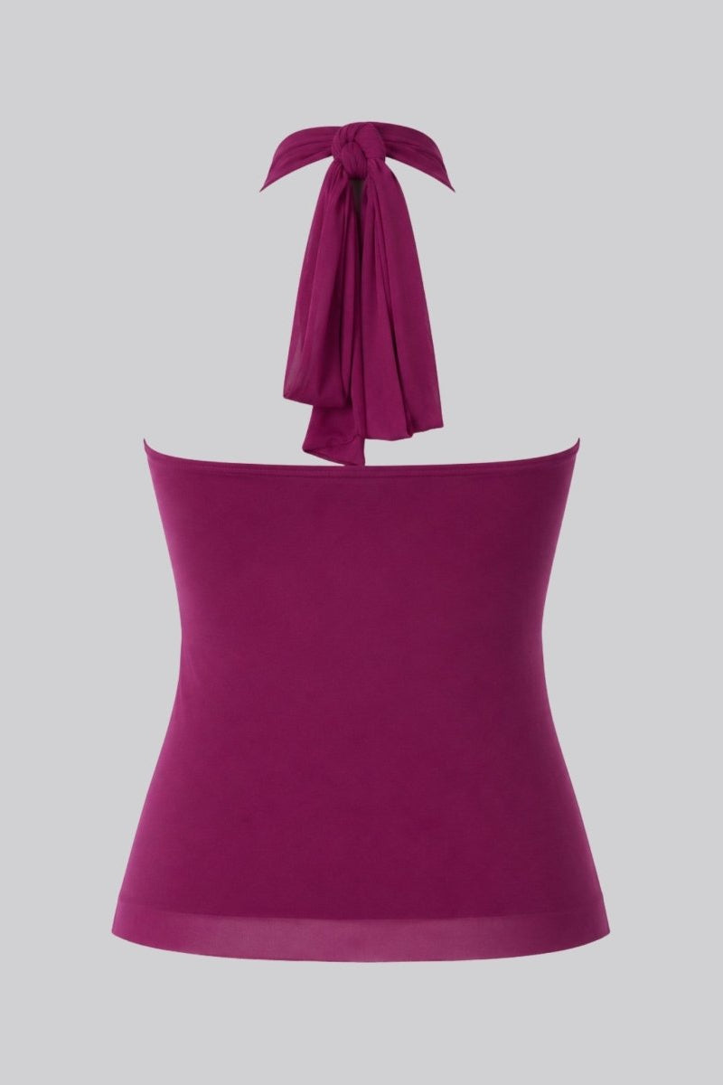  Product back view shot of magenta tie-neck halter top showing opaque back panel and fabric sash.