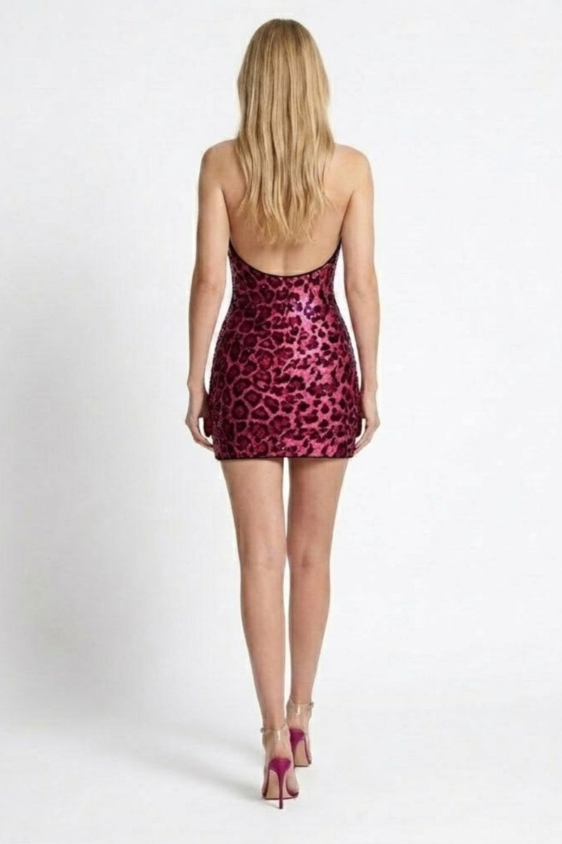 Back view of the Fenlo Form red leopard sequin dress showing the low open back and mini length.