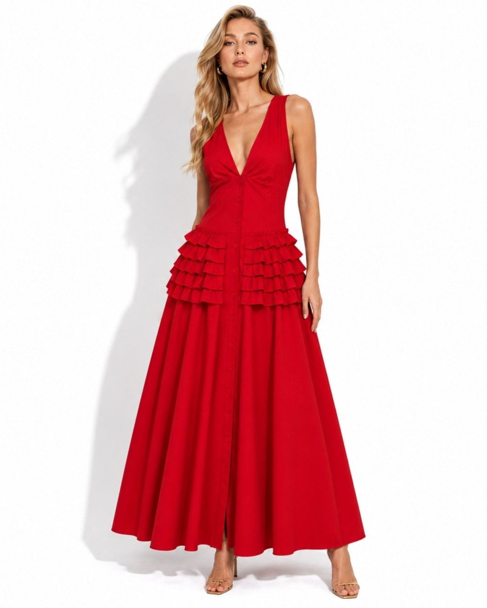  Model showcasing the vibrant red a-line ruffled cocktail dress with functional front buttons by luxury brand Kouvr.