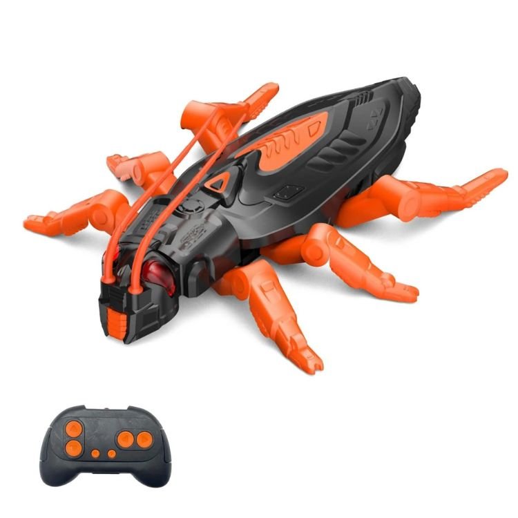 A black and orange remote controller with multiple joysticks and buttons for controlling the wall climbing toy.