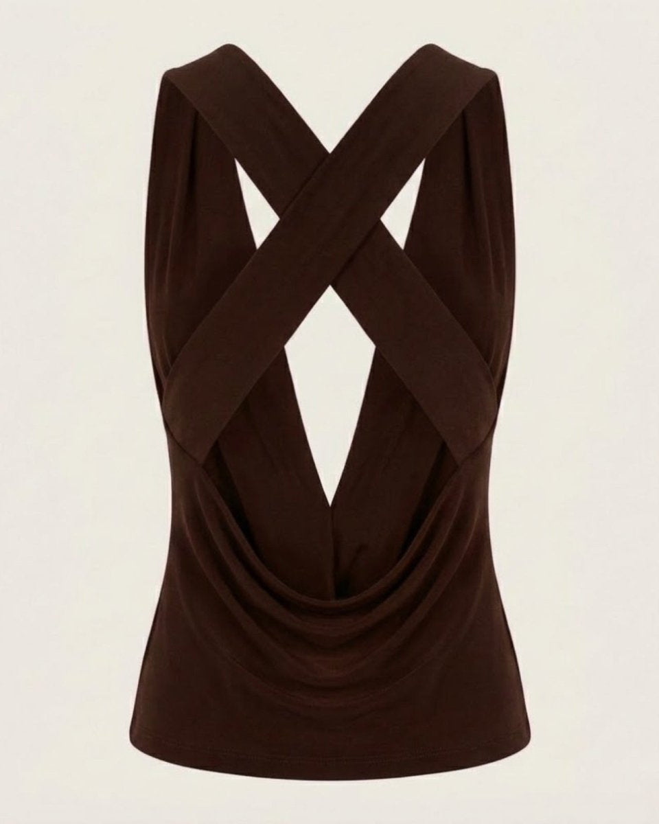 Flat lay of the back of the Rhea top, detailing the structured criss-cross straps and open back design.