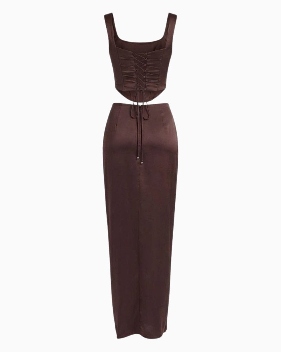 Flat lay of the Rona dark brown satin set, displaying the back of the top with its corset lacing and the simple back of the maxi skirt.
