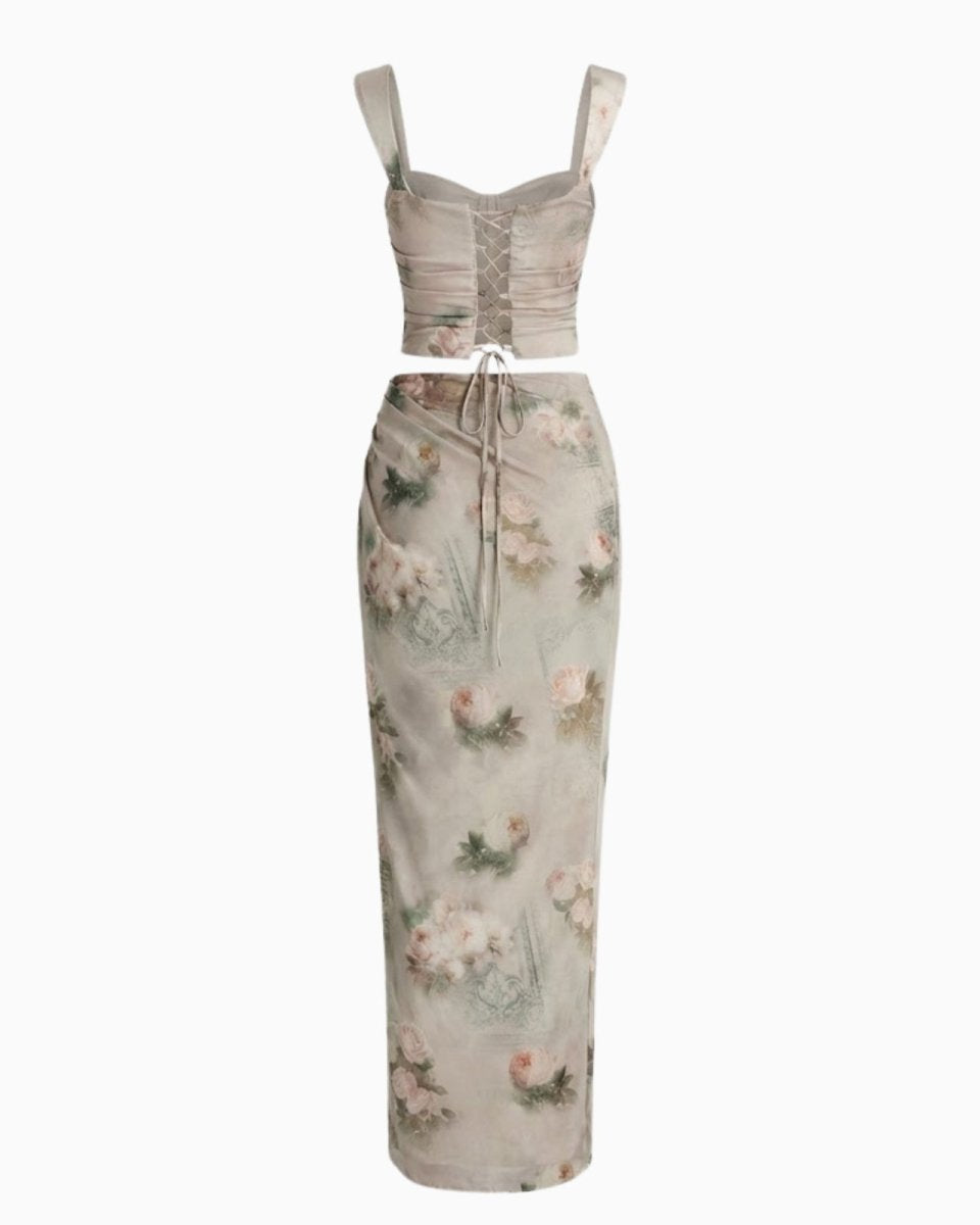 Flatlay of the Rona floral set from the back, displaying the lace-up corset and the full construction of the maxi skirt.