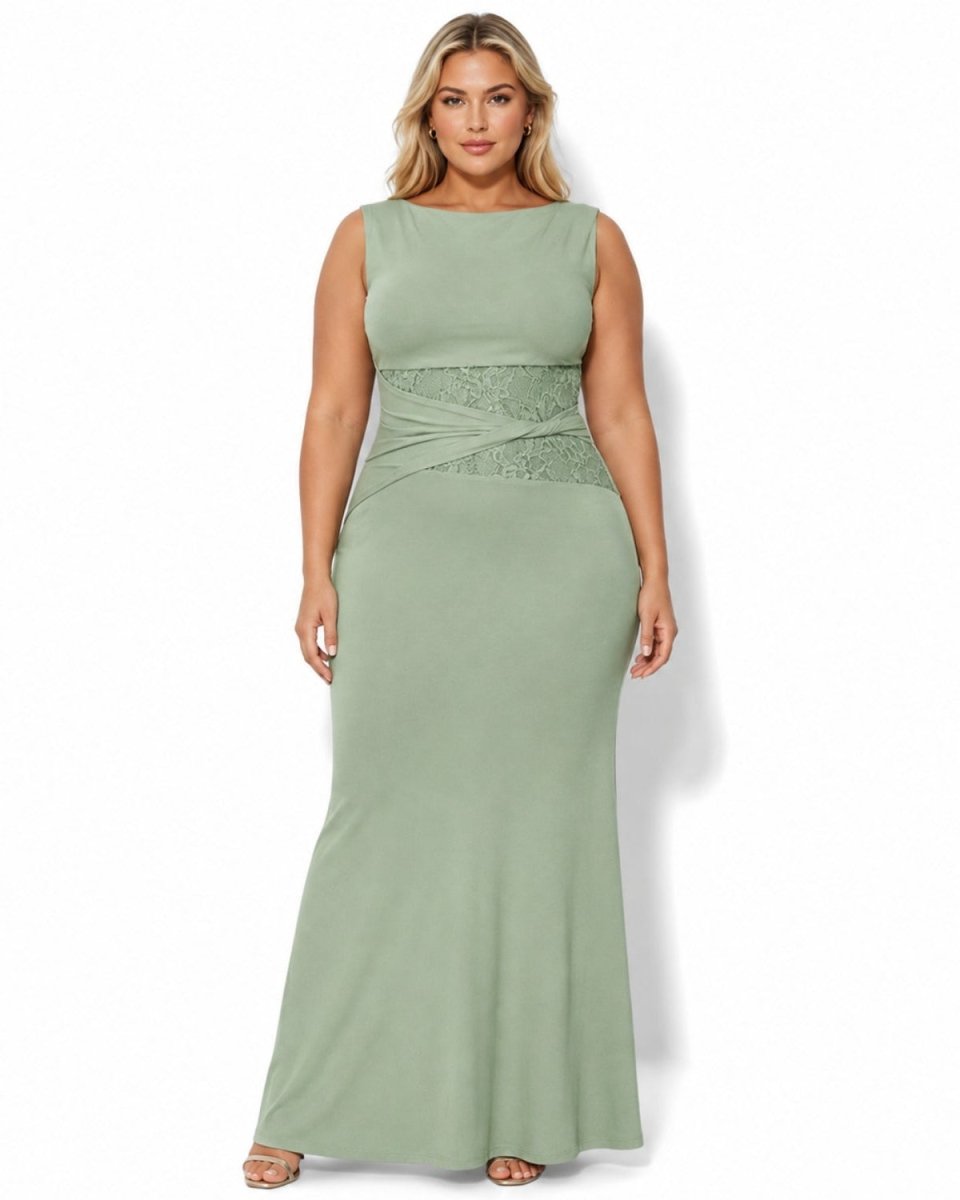 A woman modeling a sleeveless sage green maxi dress with a textured lace waistband, photographed against a plain white background.