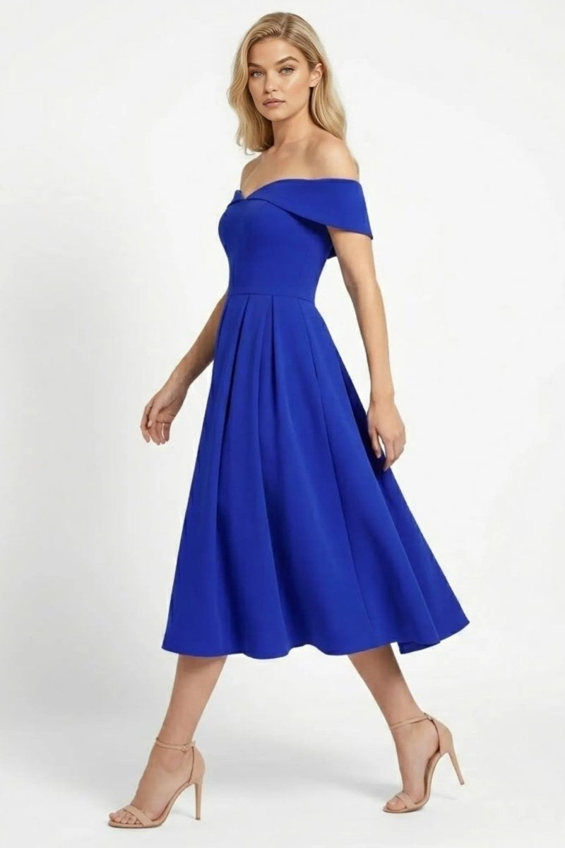 Side profile of a sapphire blue A-line cocktail dress with sweetheart neckline