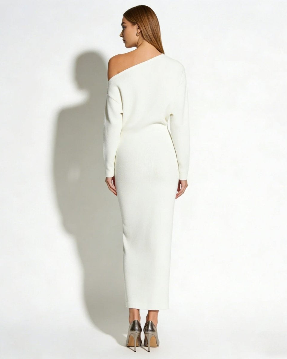 Back view of a model in the Selena off-the-shoulder white knit evening gown.