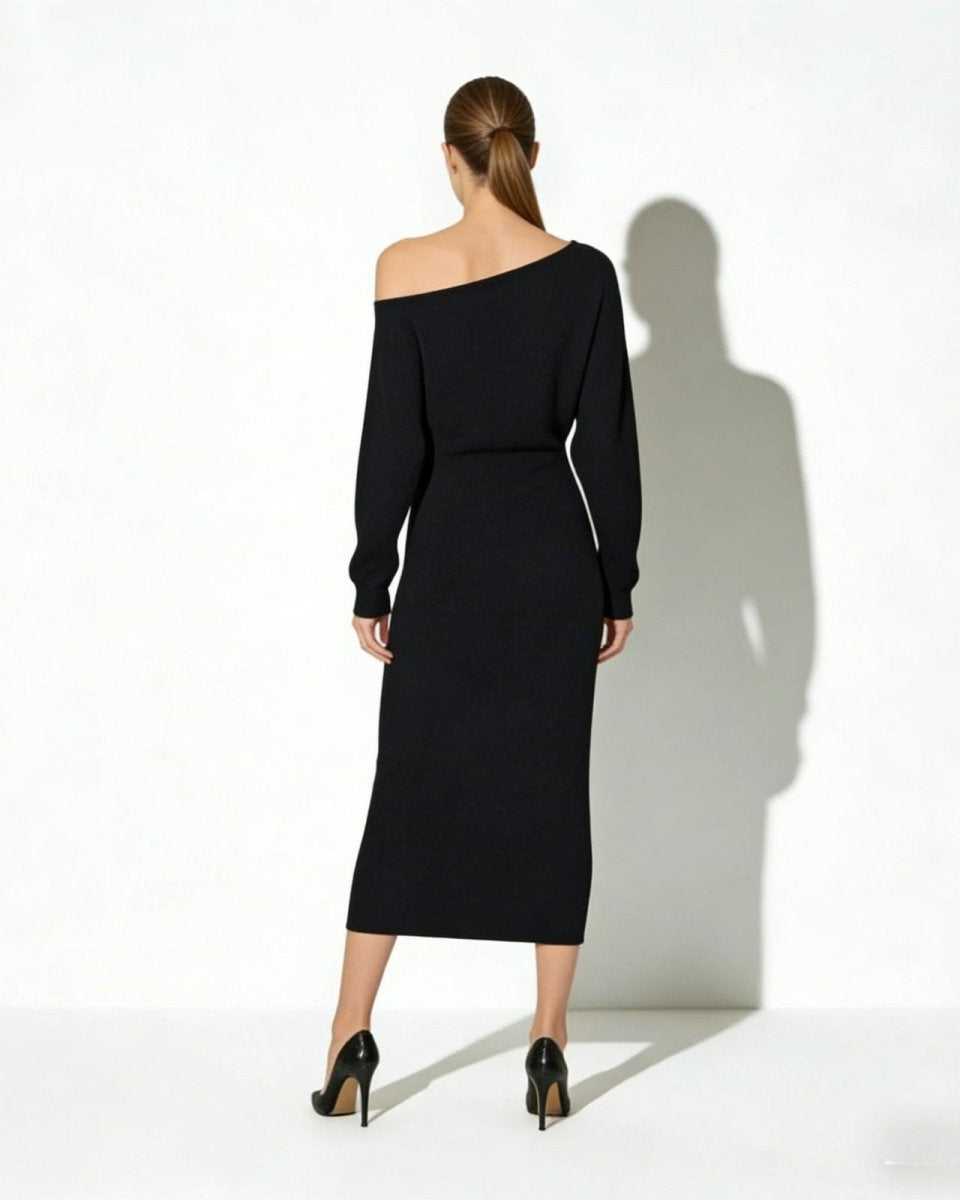 Back view of the Selena asymmetrical black midi dress showcasing its elegant neckline.