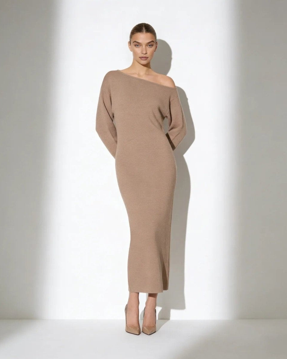 Model wearing the Selena one-shoulder long sleeve knit midi dress in camel, front view.