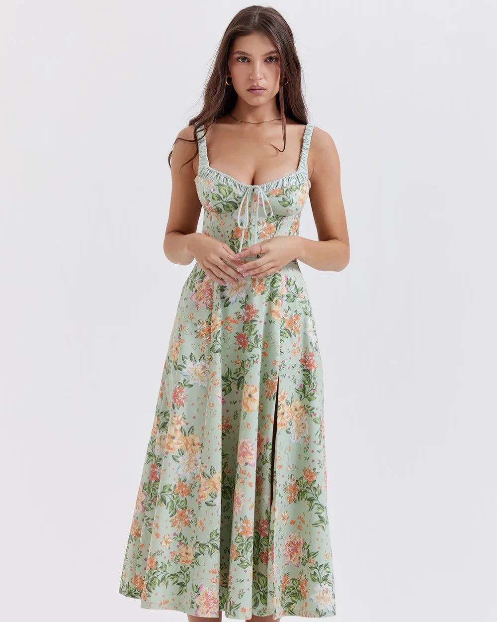 Woman wearing a floral dress on a white background