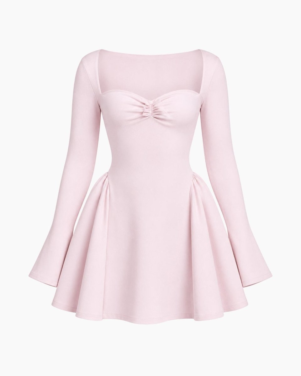 A light pink long-sleeve skater dress with a sweetheart neckline, a gathered sweetheart bust, and a flared skirt, shown against a plain white background.