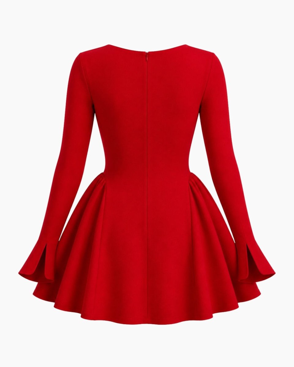 A bright red long-sleeve skater dress with a flared pleated skirt, shown from the back on a plain white background.