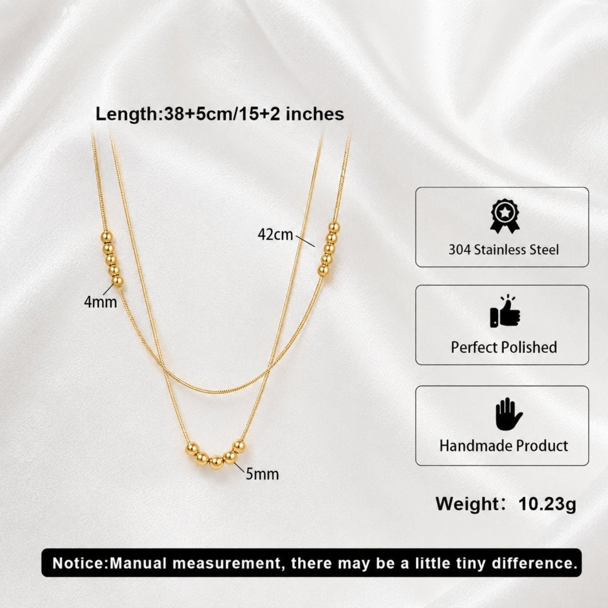 Technical specifications of gold layered bead necklace showing 15 inch length with 2 inch extender, 304 stainless steel material, and hand-polished details. 