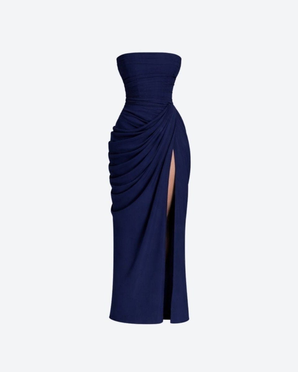Back view of an unmodeled navy blue dress displaying the intricate corset lacing and ruched gathering at the lower back.