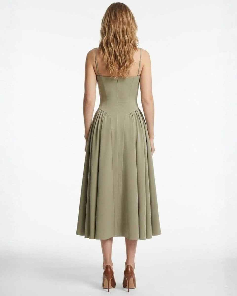 Back view of the taupe A-line midi dress showing the spaghetti straps and concealed zipper closure.
