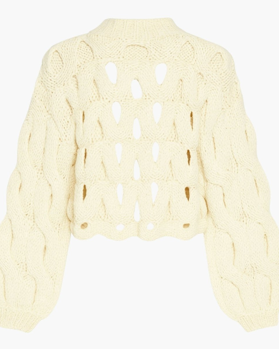 Back view flat lay of the ivory Vanice open-knit sweater, detailing the ribbed mock neck and scalloped hem.