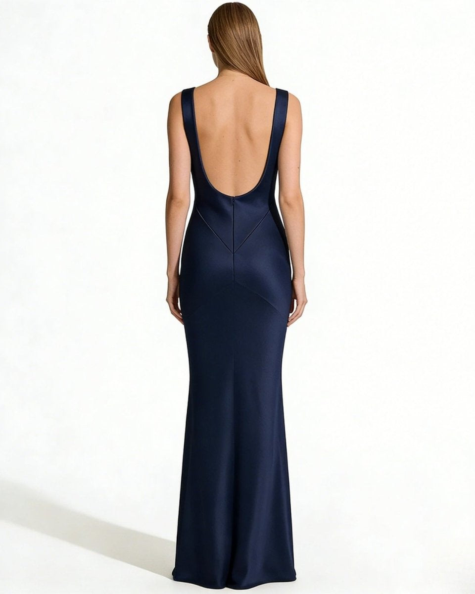 Back view of the Vickie navy satin evening gown, showcasing the dramatic low scoop back and elegant floor-length train.