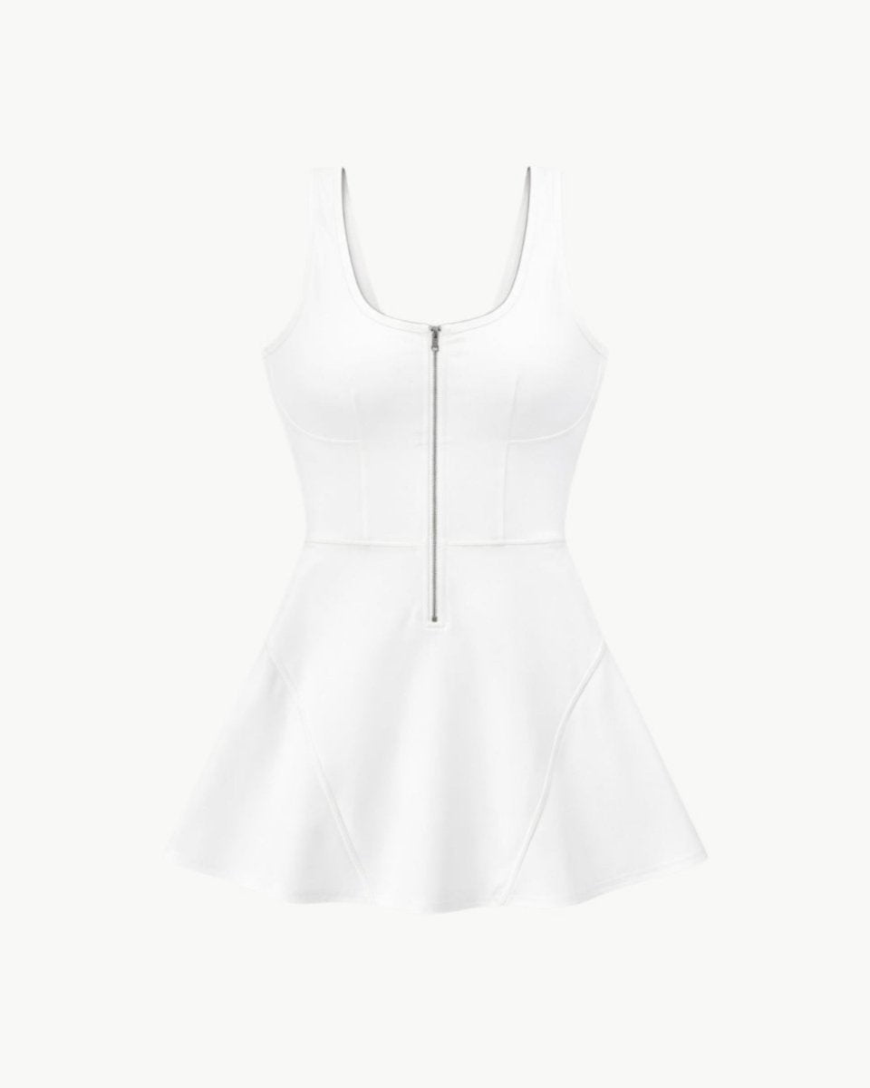 Front product view of a white athletic dress showing a sporty racerback cut and paneled mini skirt