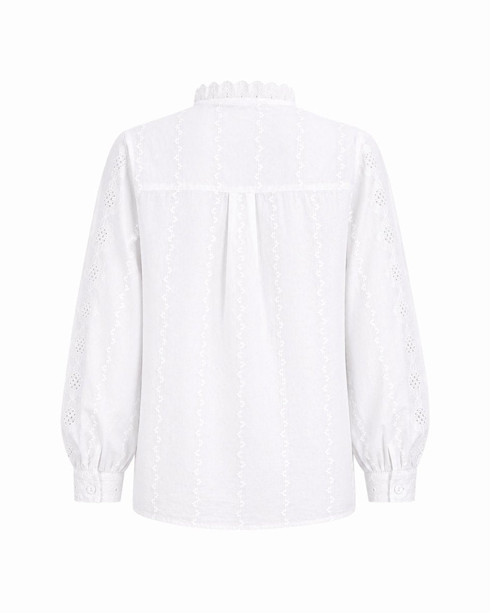 Flat lay back view of the white cotton ruffle neck blouse showing back yoke design